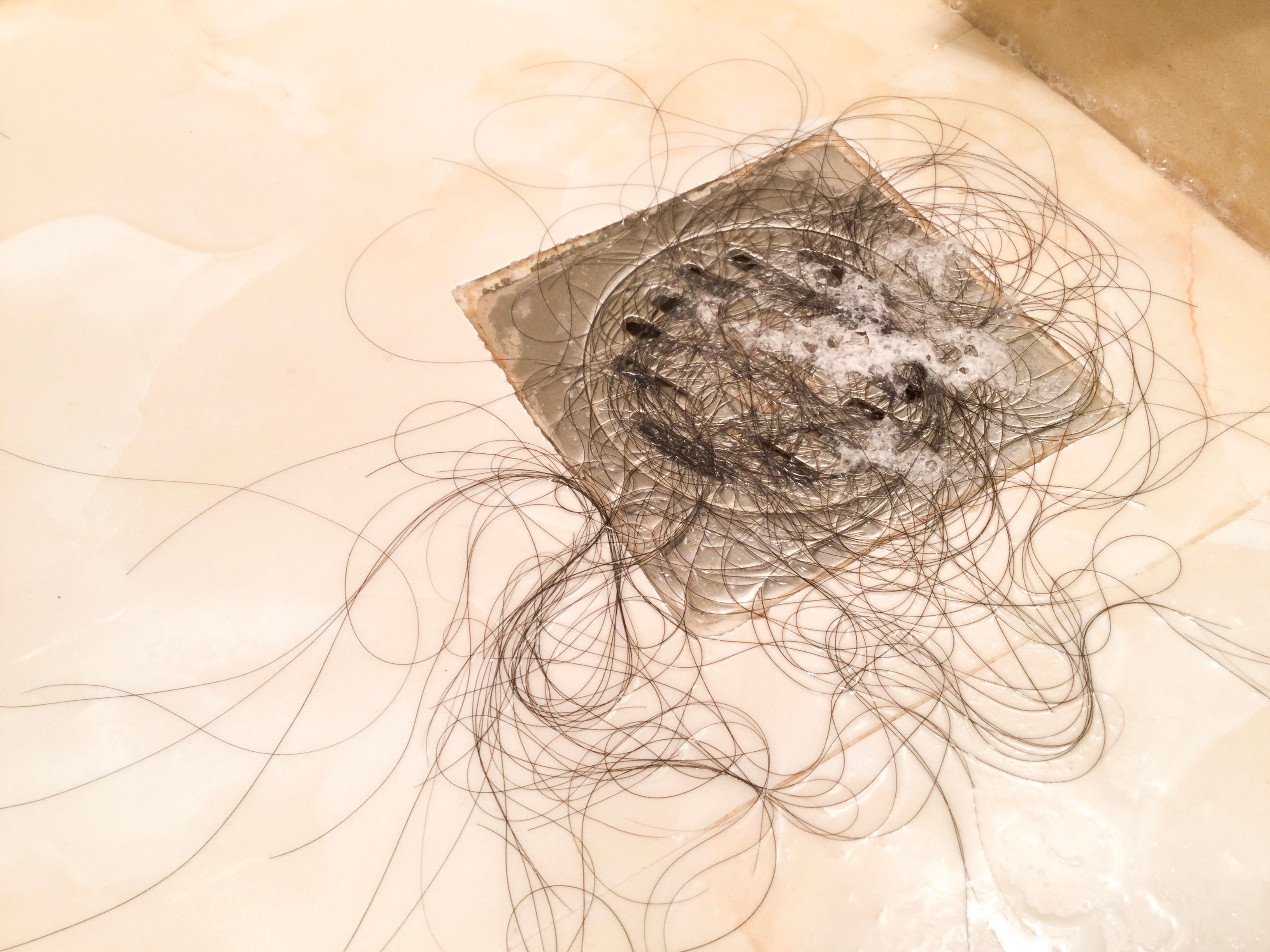 4 Simple Hacks to Remove Hair from a Shower Drain